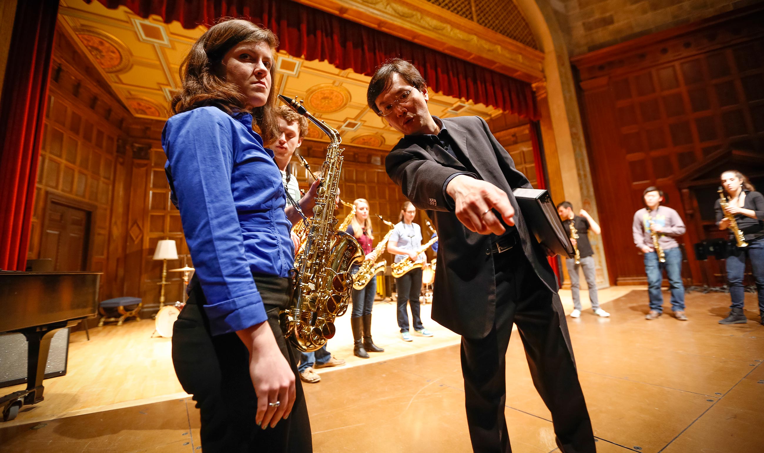 Ainsley Kilgo ’15E takes direction from professor Chien-Kwan Lin. Lin is taking Eastman’s classical saxophone program to international prominence. 