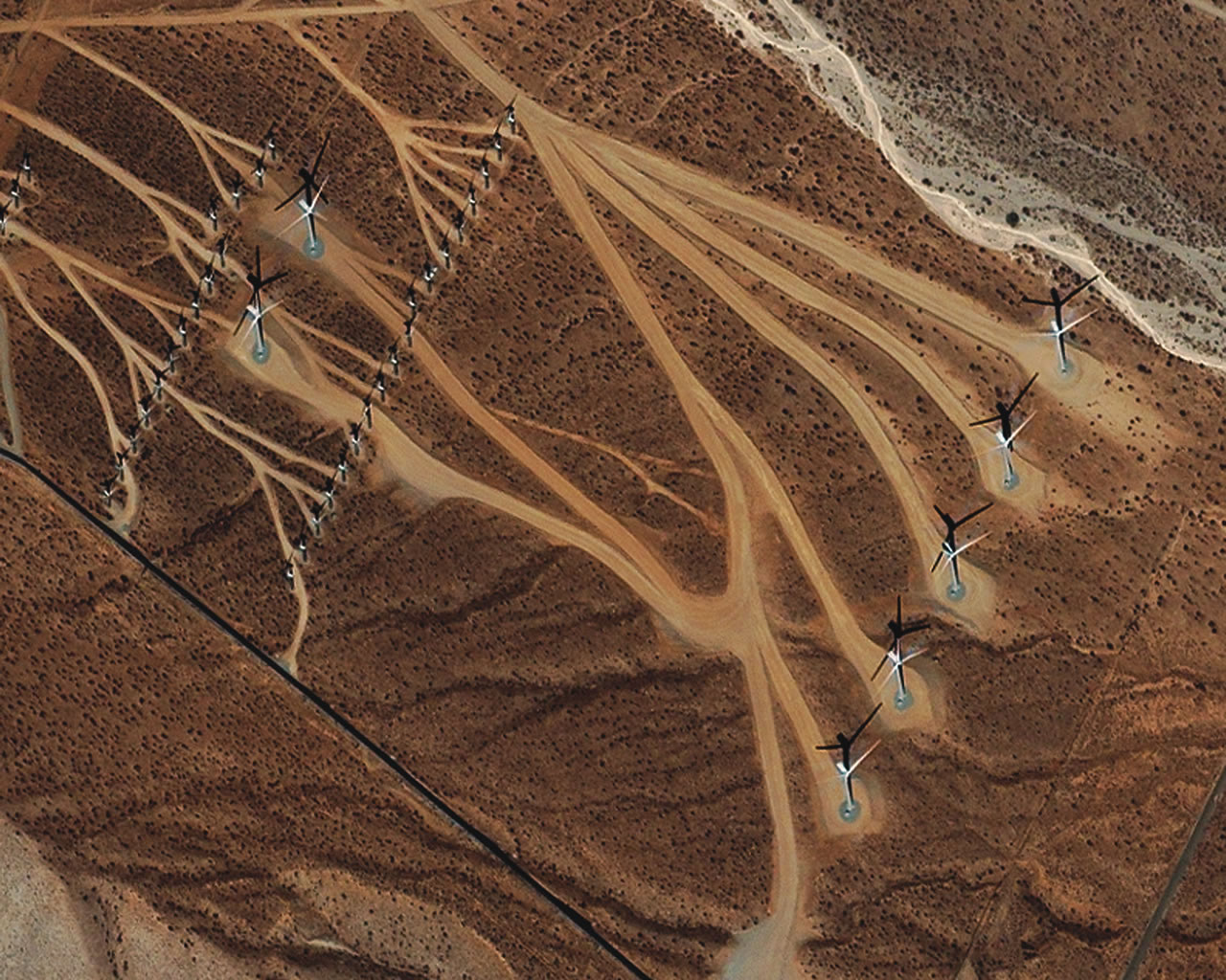 Wind turbines near San Gorgonio Pass in California.  The pass creates a wind tunnel making it very suitable for wind power generation.  Image captured by the Ikonos satellite in 2003.  Retrieved from: http://earthobservatory.nasa.gov/IOTD/view.php?id=5656, last accessed 5/3/16.