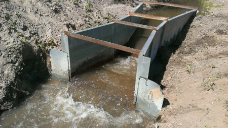 Flume installed in an irrigation canal.  Image from: https://www.openchannelflow.com/blog/irrigation-flumes, last accessed 5/26/18.
