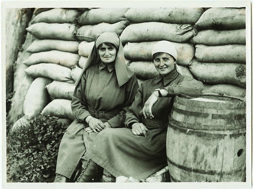 Photographers Elsie Knocker and Mairi Chisholm outside their advanced dressing station, Pervyse. April 27, 1917.
