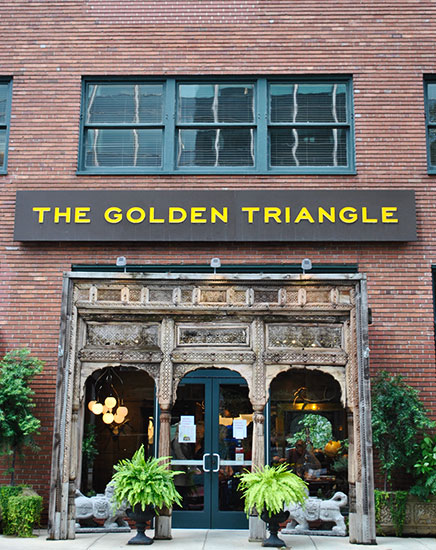 The Golden Triangle is part of the Reid Murdoch Building, created by George C. Nimmons in 1914.