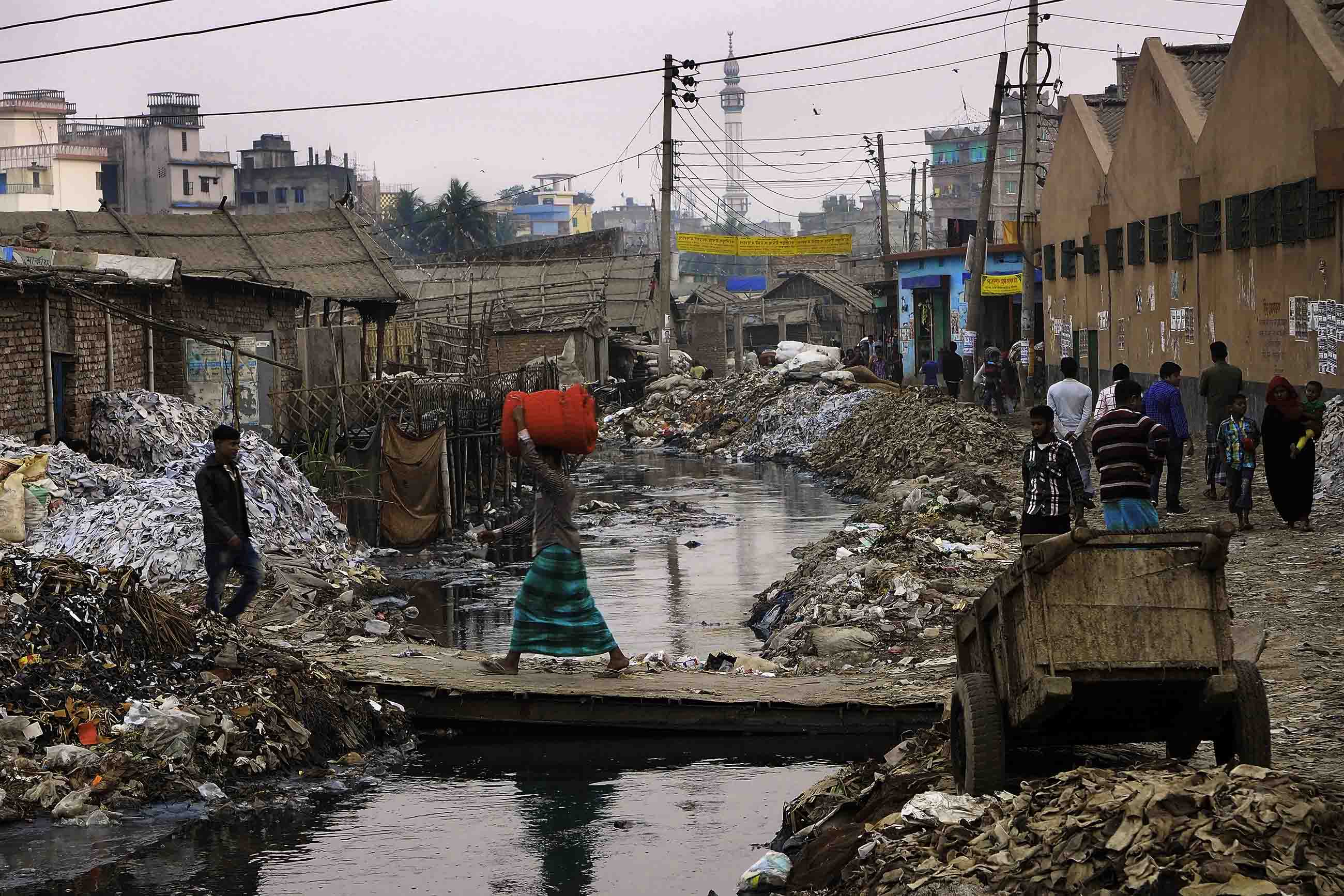 For decades, Hazaribagh has been the epicenter of Bangladesh’s leather tanning industry. More than 150 tanneries in the Dhaka neighborhood pump untreated wastewater into open canals lined with rotting hides and leather scraps. Image by Larry C. Price. Bangladesh, 2016.