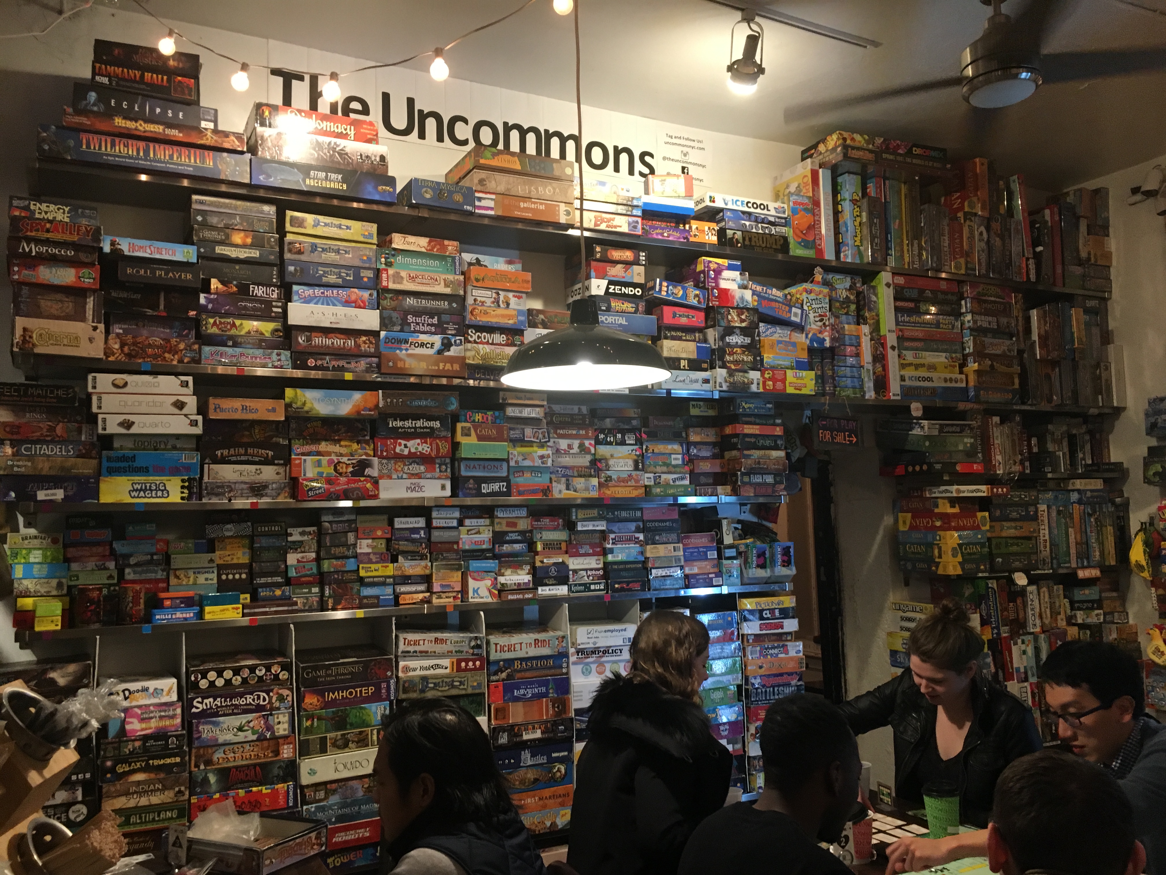 One of The Uncommons’ game walls. The store has hundreds of games for players to choose from.