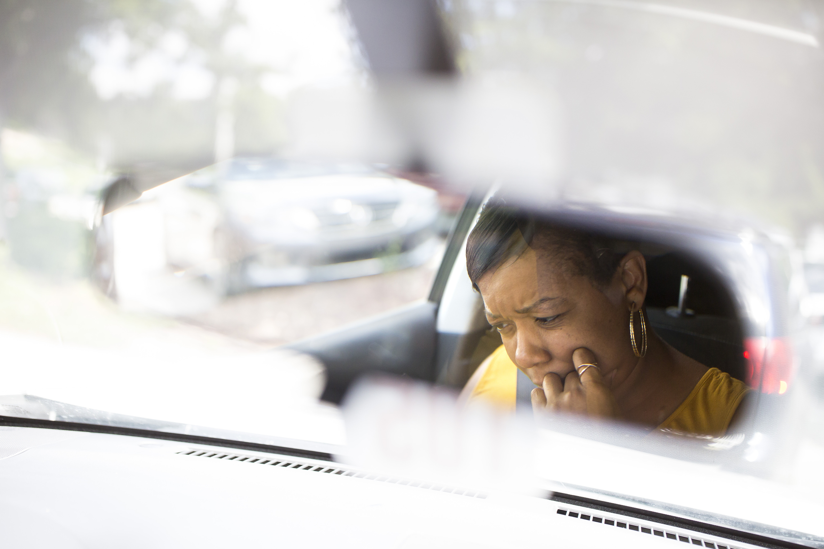Ayeisha Owens waits in the carpool line to pick up her daughter Karisma, 9, on her last day of school on Friday, June 8, 2018. “I felt anxious,” she said. “Only because I didn’t know what they would be doing.”