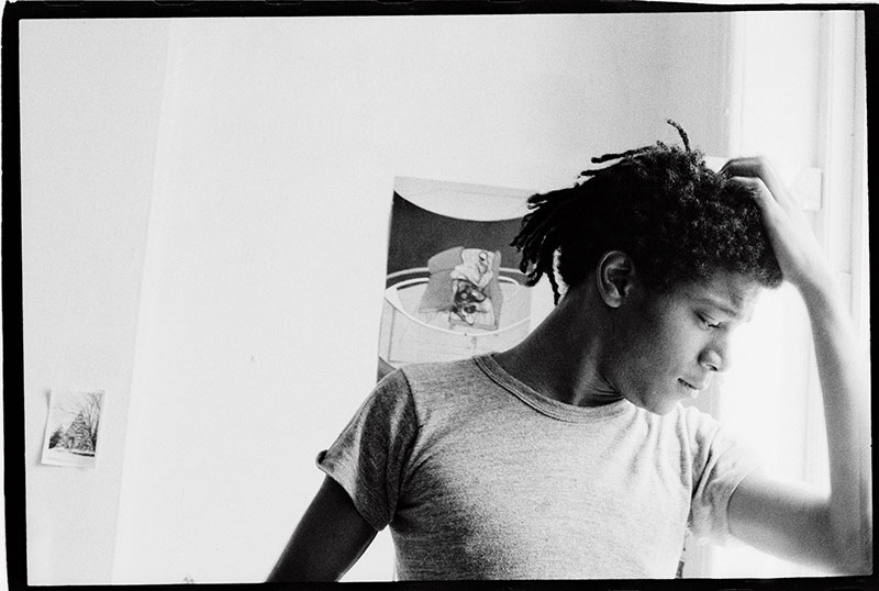 Photography by ManfredBaumann.com, Basquiat in the apartment, 1981. Photograph by Alexis Adler.